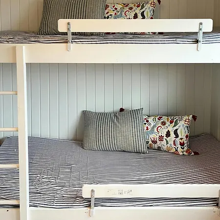 Wooden House In The Dunes Close To The Sea *