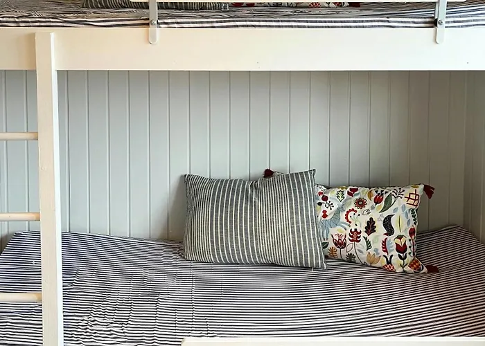 Wooden House In The Dunes Close To The Sea *