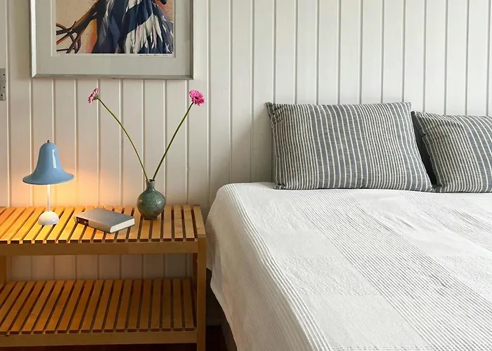 Сasa de vacaciones Wooden House In The Dunes Close To The Sea